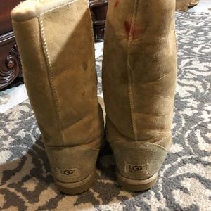 Lovingly worn UGG boots in beige.